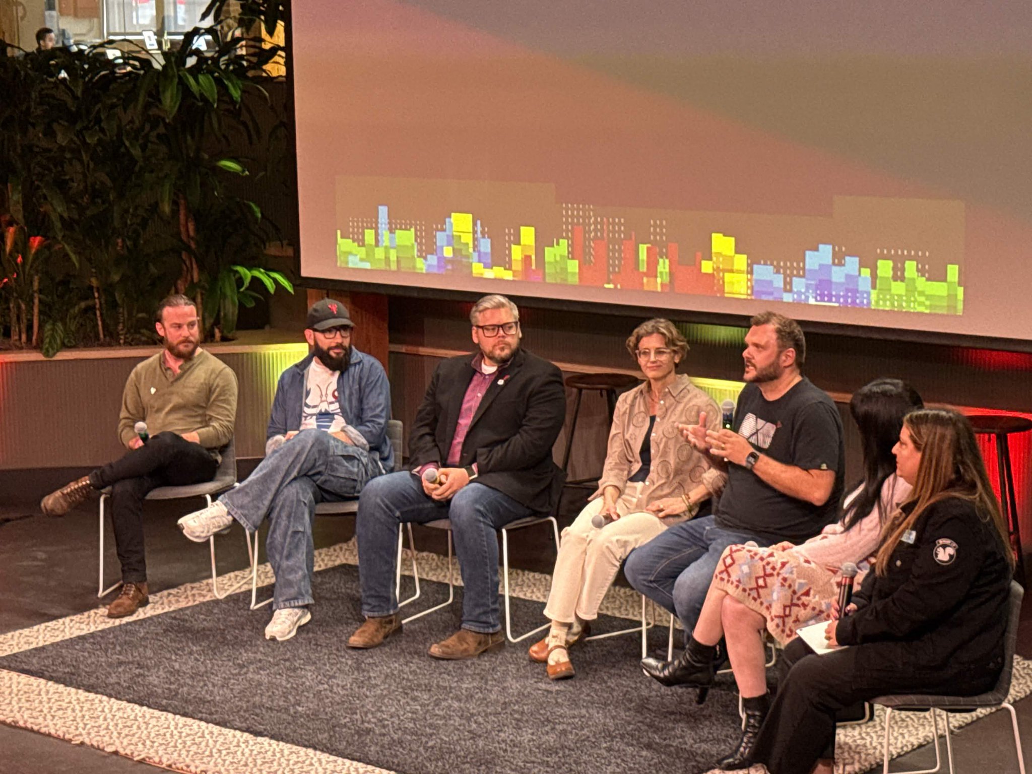 OpenClaw maintainers seated on stage for a panel at GitHub.